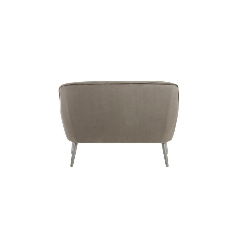Grey velvet two-seater sofa with a rounded back and sleek metal legs, showcasing a modern and minimalist design. The fabric has a soft texture, and the overall shape is contemporary, suitable for various interior styles