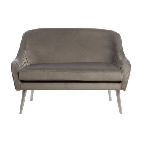 Grey velvet two-seater sofa with a curved backrest and sleek metal legs, featuring a minimalist design and soft upholstery