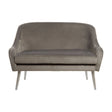 Grey velvet two-seater sofa with a curved backrest and sleek metal legs, featuring a minimalist design and soft upholstery