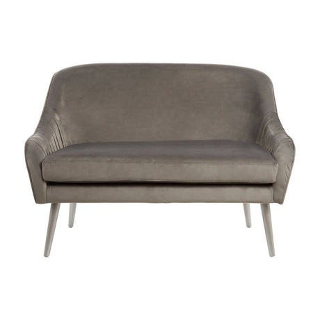 Grey velvet two-seater sofa with a curved backrest and sleek metal legs, featuring a minimalist design and soft upholstery