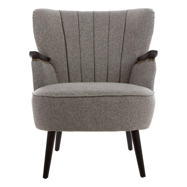Grey fabric armchair with dark wooden legs and fluted backrest, front view