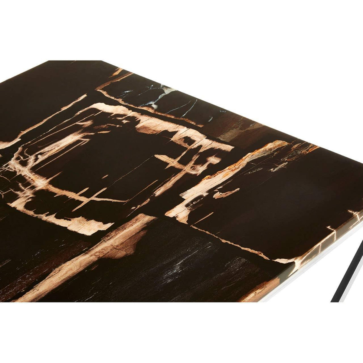 Glossy black marble dining table top with brown and white veining, close-up view