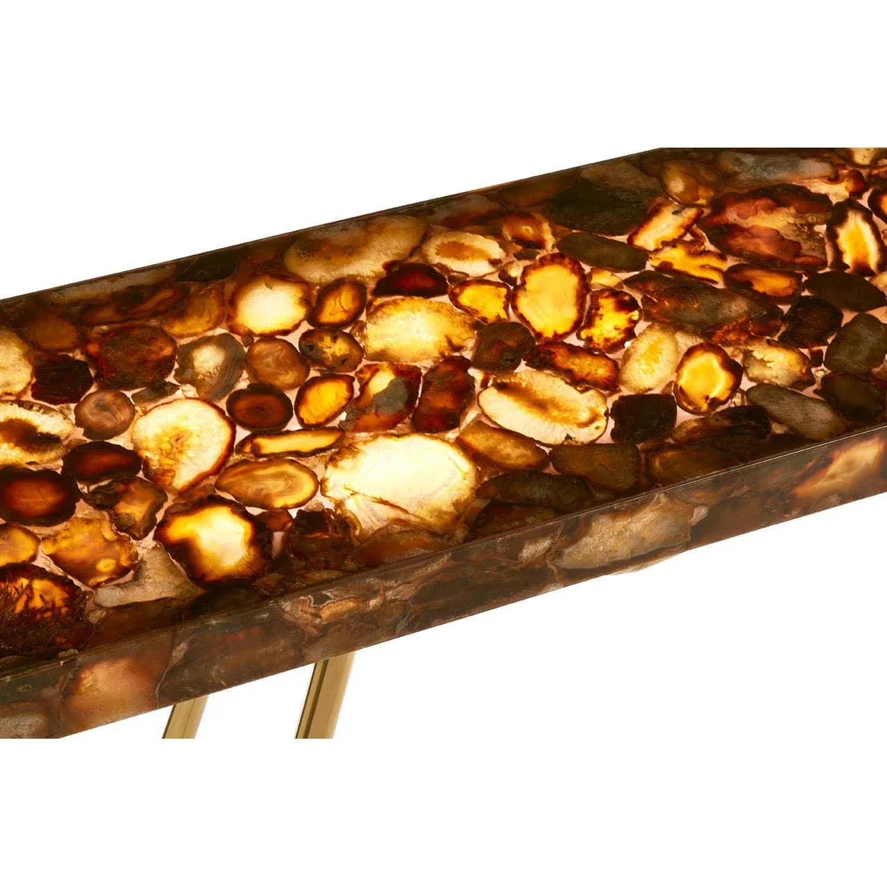 Close-up of polished agate stone console table top with gold metal legs