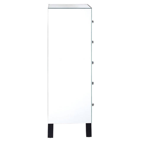A sleek, modern chest of five drawers featuring a glossy white finish and a mirror frame. The design includes clean lines and minimalist aesthetics, complemented by four sturdy black legs for stability. The drawers are evenly spaced along the front, providing ample storage space while maintaining a stylish appearance