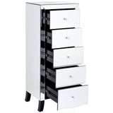 Tall white chest of drawers featuring five sleek, glossy drawers with silver handles, set on short black legs. The design includes a mirror frame at the top, enhancing its modern aesthetic