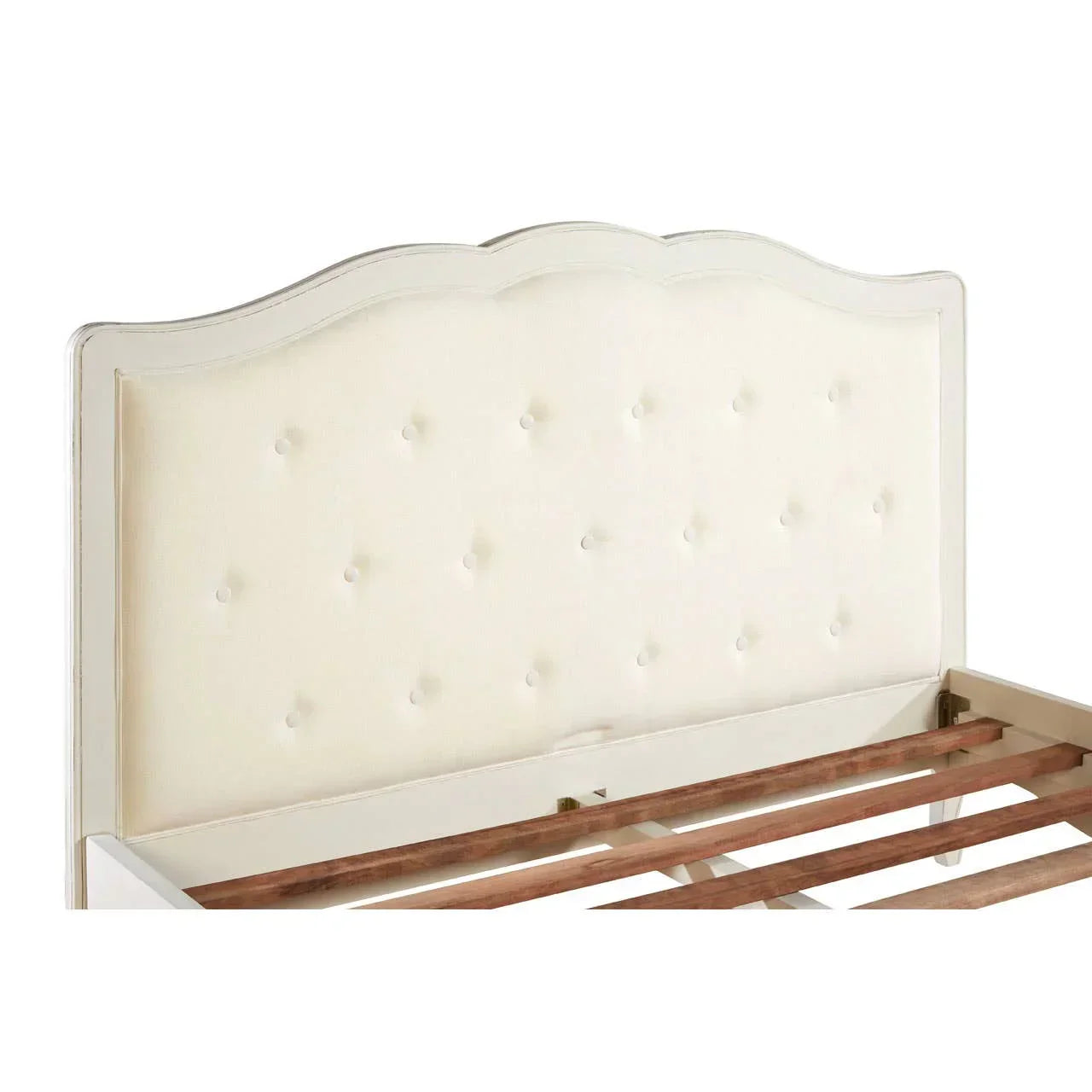Cream upholstered bed frame with tufted headboard and visible wooden slats