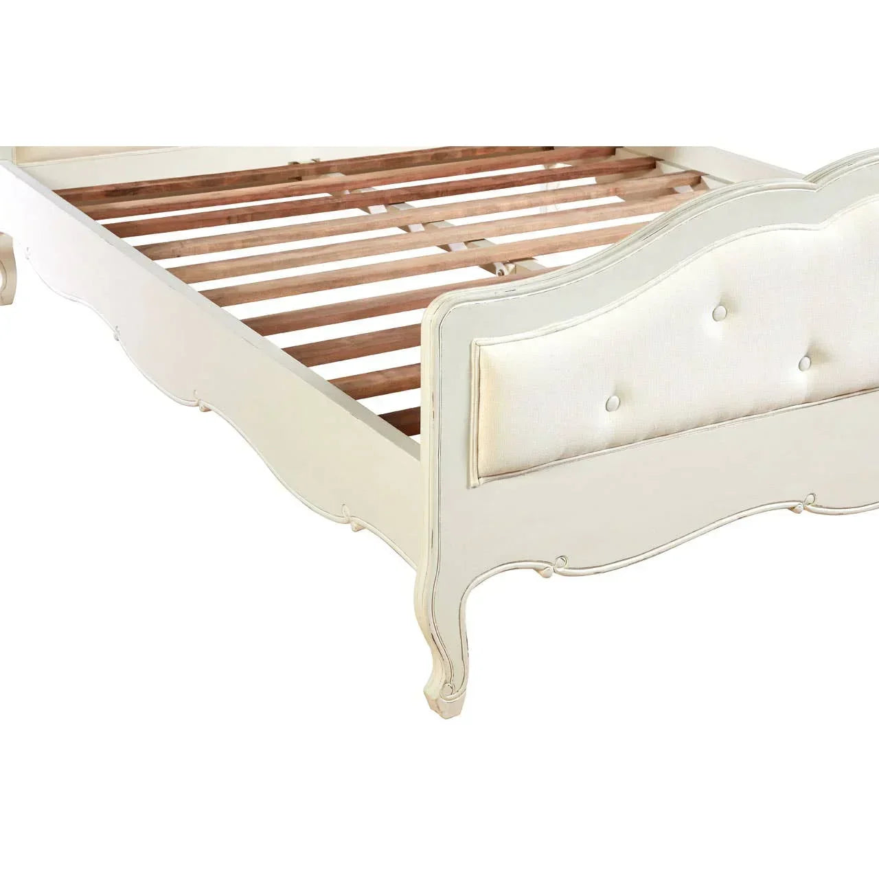Cream wood bed frame with upholstered curved footboard and button details