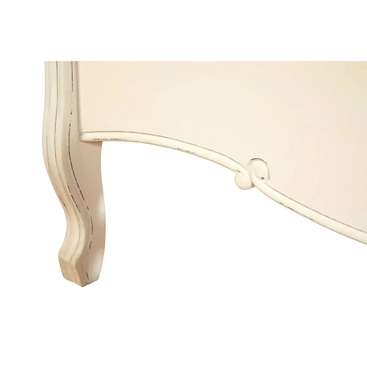 Cream painted wooden bed footboard with carved detailing and curved leg