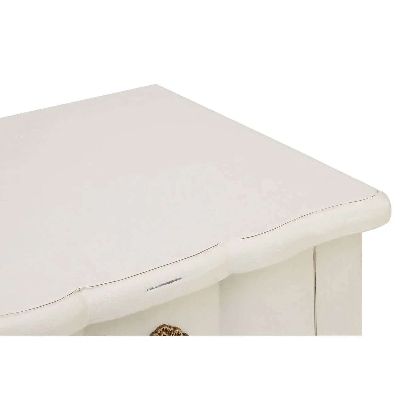 Close up of white wooden bedside table corner with curved edge and antique detail