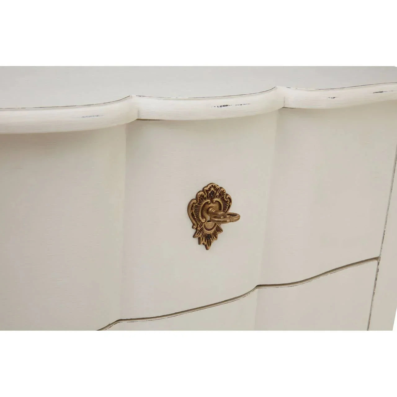 Cream wooden drawer with vintage gold handle and scalloped edge detail