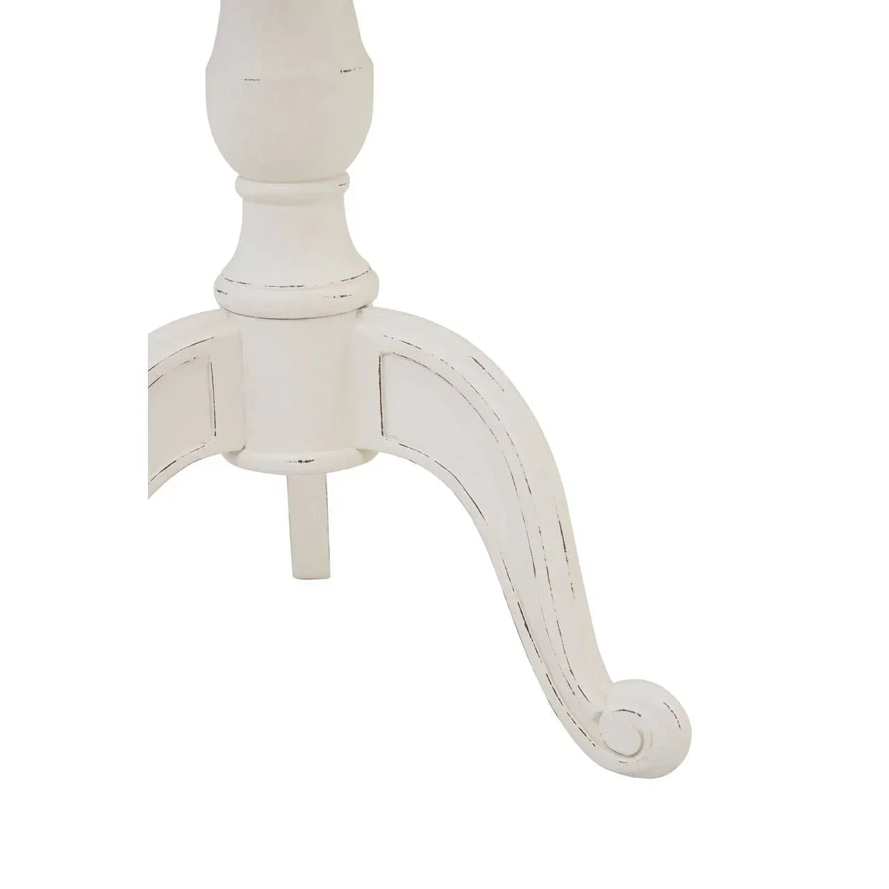 Distressed white wooden table leg with carved scroll detail