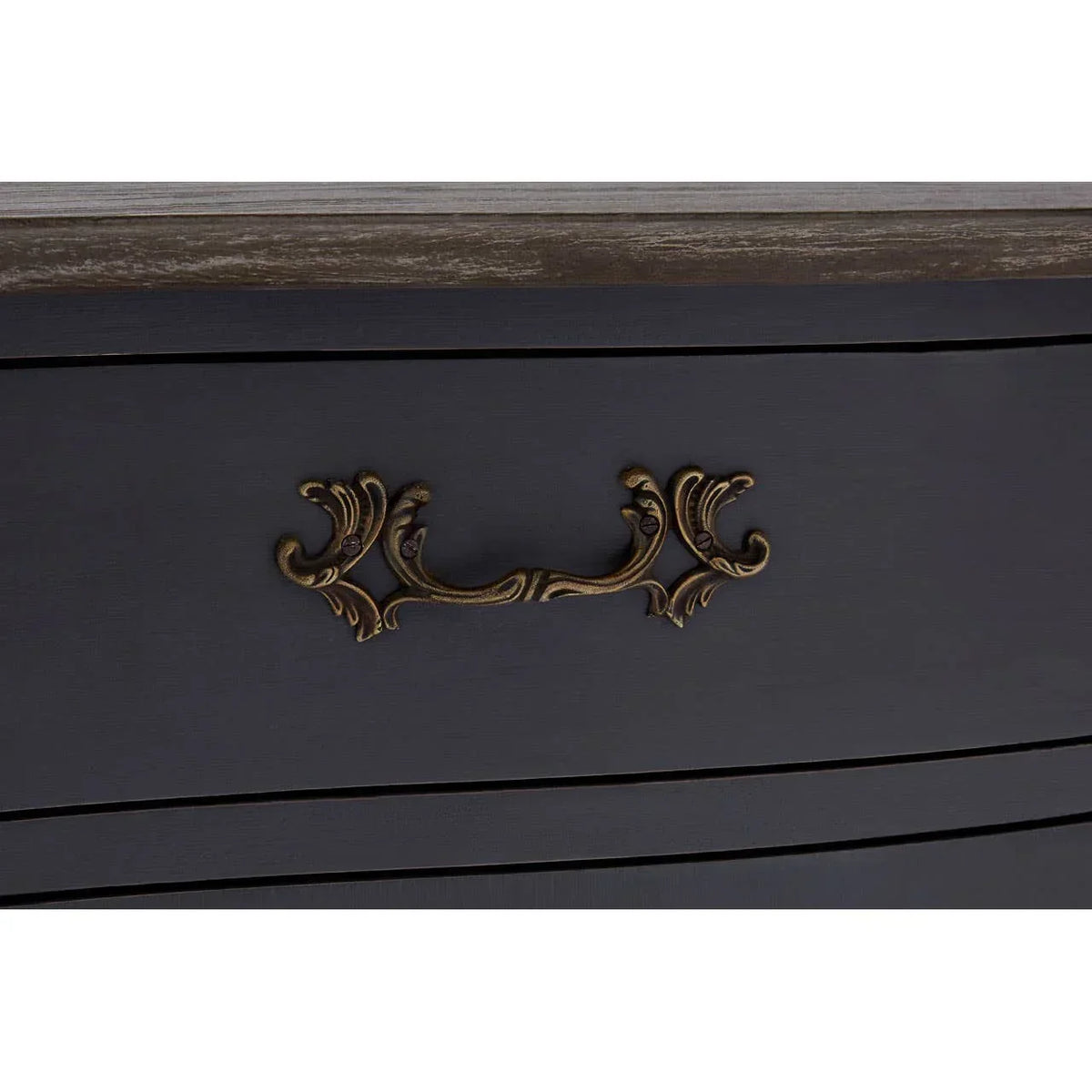 Dark wood chest of drawers with ornate brass handle detailing