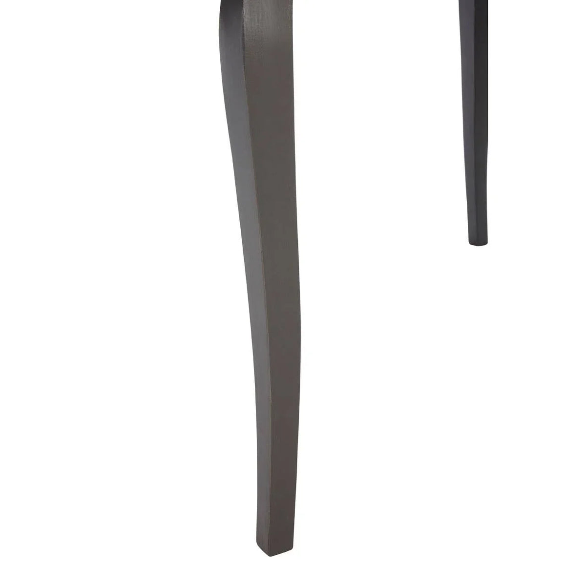 Close view of dark wood dining table legs with smooth finish