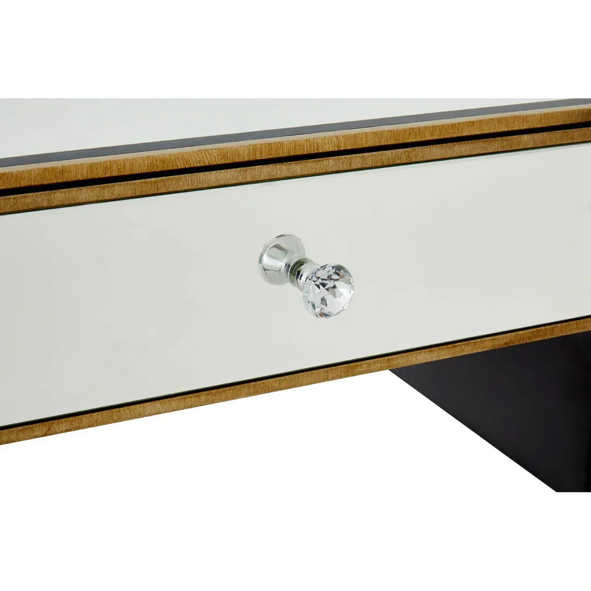Mirrored glass drawer with crystal knob and wooden trim on furniture piece