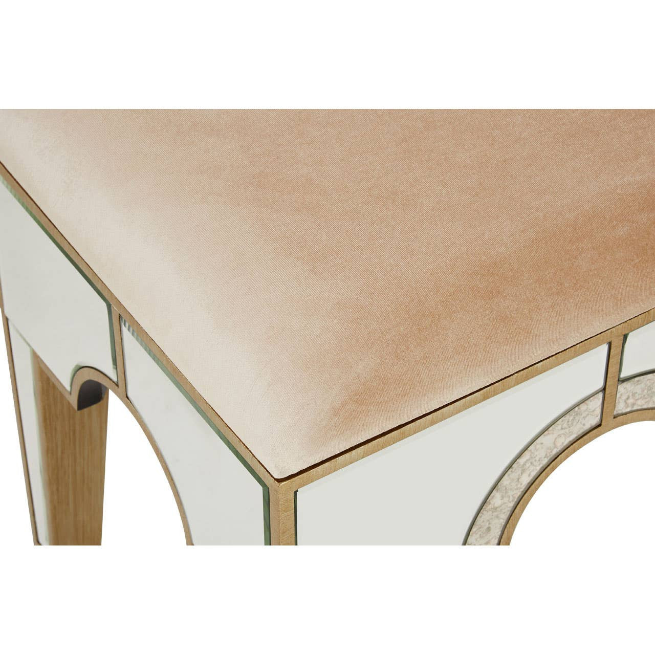 Champagne gold and mirrored stool featuring a soft, light-colored upholstered top and elegant geometric detailing on the sides. The stool has a sleek, modern design with a reflective surface that enhances its luxurious appearance