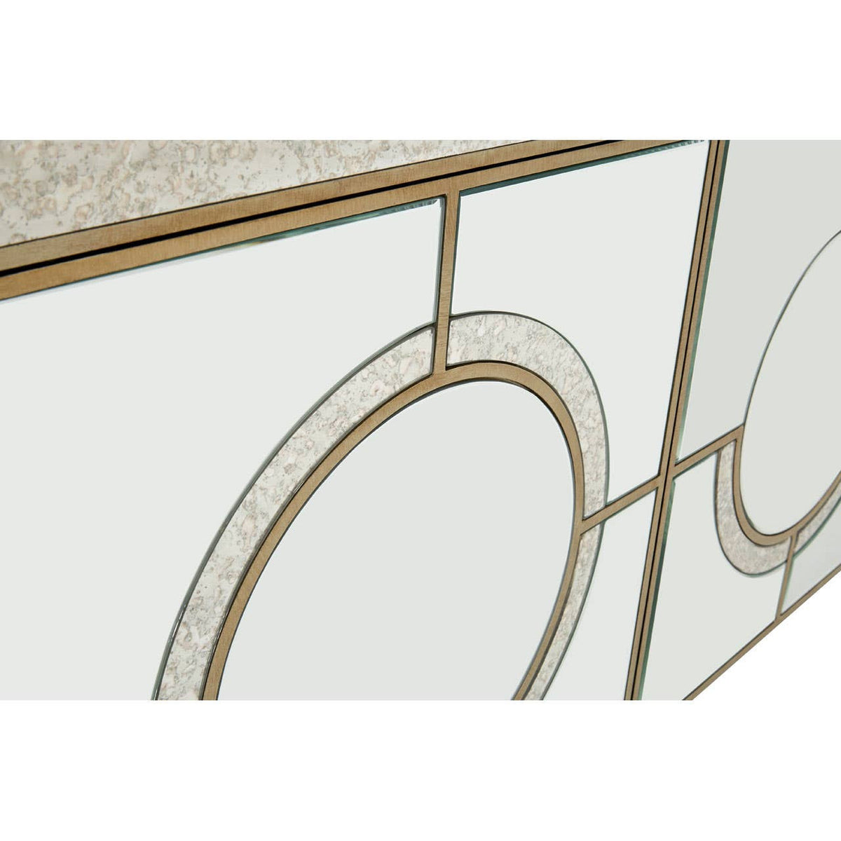 Champagne gold and mirrored sideboard featuring a sleek design with circular patterns and a smooth surface, highlighting the elegant finish and modern aesthetic
