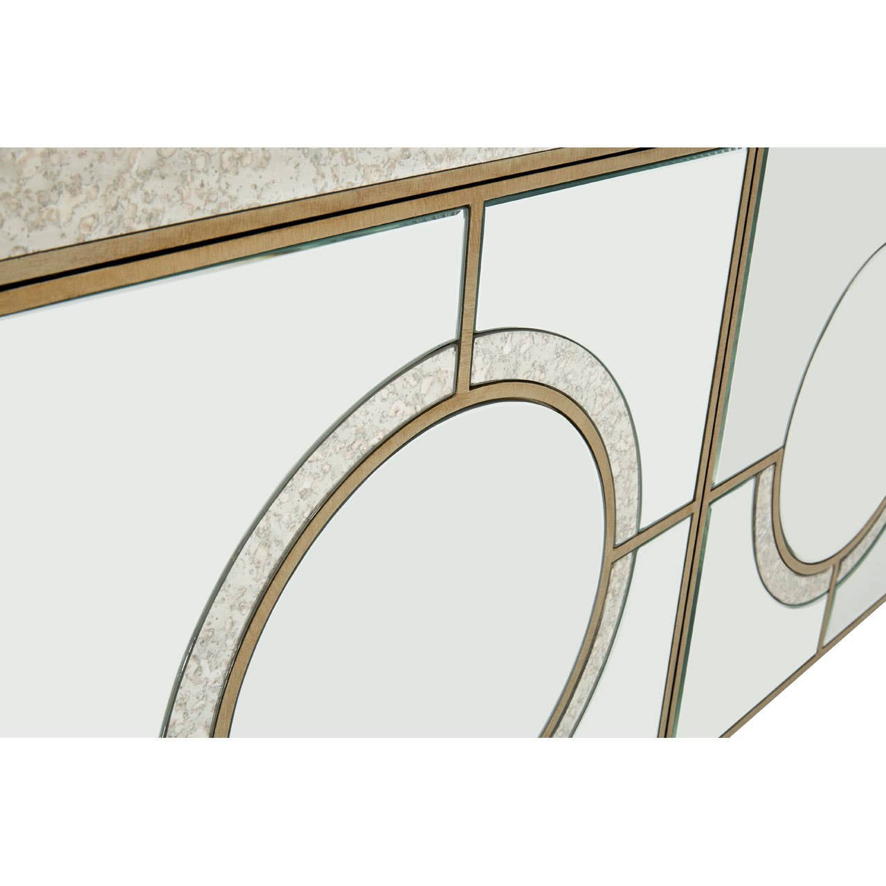 Champagne gold and mirrored sideboard featuring a sleek design with circular patterns and a smooth surface, highlighting the elegant finish and modern aesthetic