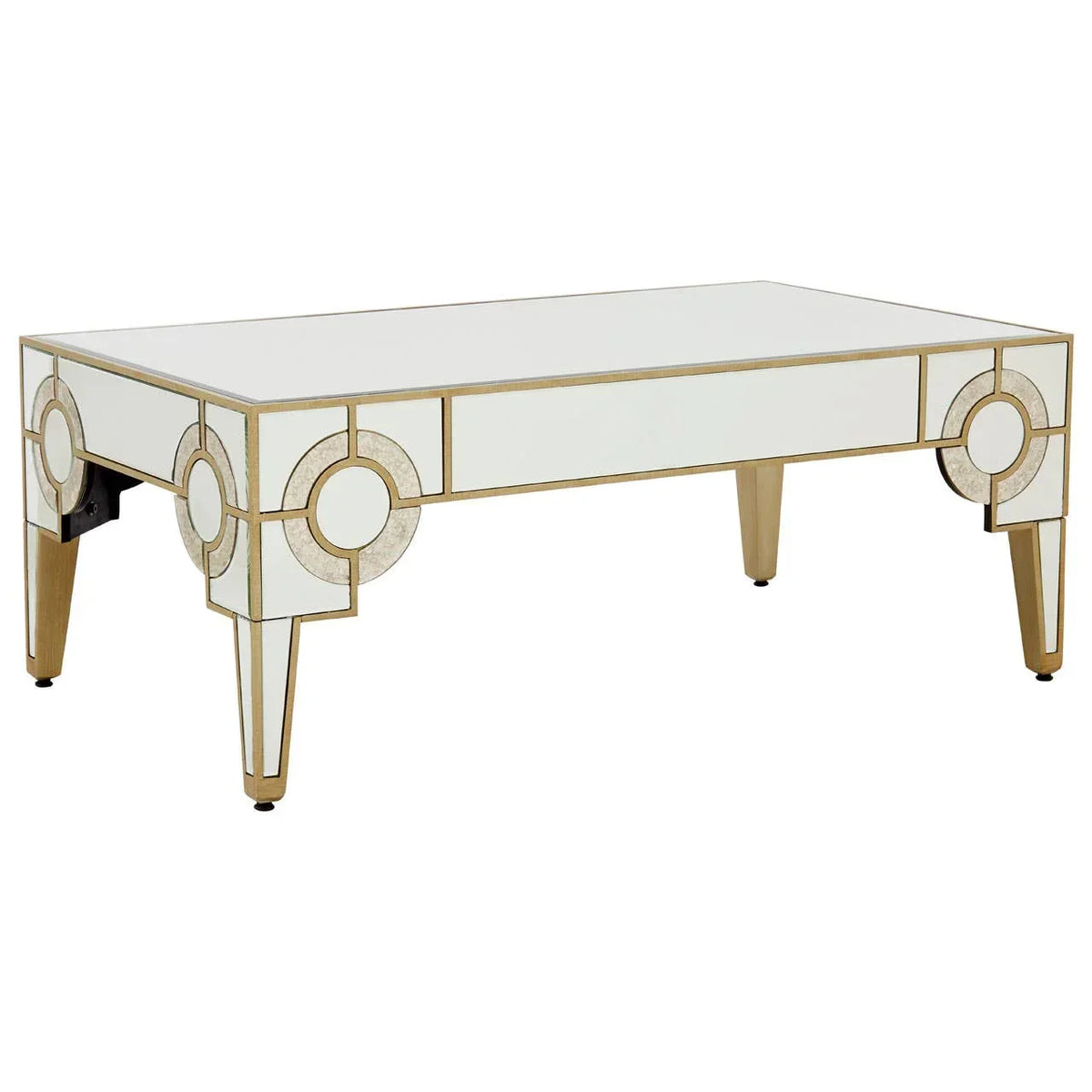 Mirrored coffee table with gold trim and geometric design on legs, angled front view