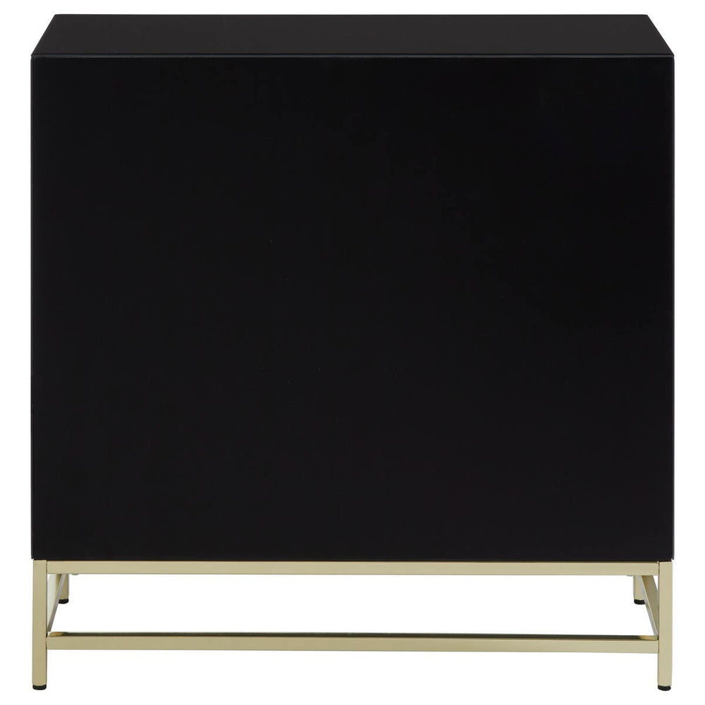 Black cabinet with a sleek, minimalist design featuring a smooth surface and gold metal legs, suitable for modern home decor