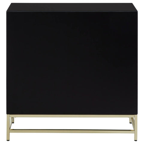 Black cabinet with a sleek, minimalist design featuring a smooth surface and gold metal legs, suitable for modern home decor