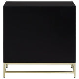 Black cabinet with a sleek, minimalist design featuring a smooth surface and gold metal legs, suitable for modern home decor