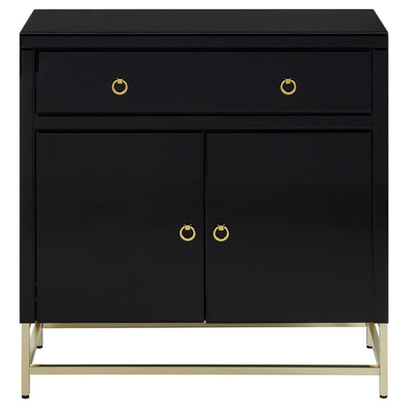 Black cabinet featuring two drawers and two doors, accented with gold hardware and standing on sleek gold legs. The cabinet has a modern design with a smooth finish, suitable for home decor