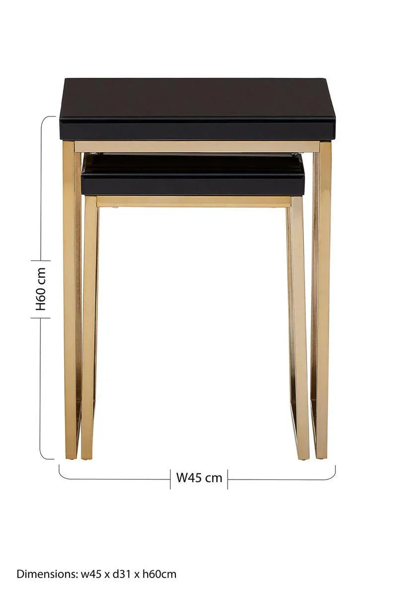 Black glass nesting tables with gold metal legs, front view, 60cm high by 45cm wide