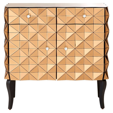 A stylish cabinet featuring a geometric pattern on the front, with a warm copper finish and two doors. The cabinet has four small, round knobs and stands on four slender black legs, adding a modern touch to its design