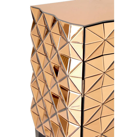 Soho 2 Door Copper Finish Cabinet featuring a geometric design with a reflective copper surface and a textured pattern of triangles, showcasing its modern aesthetic