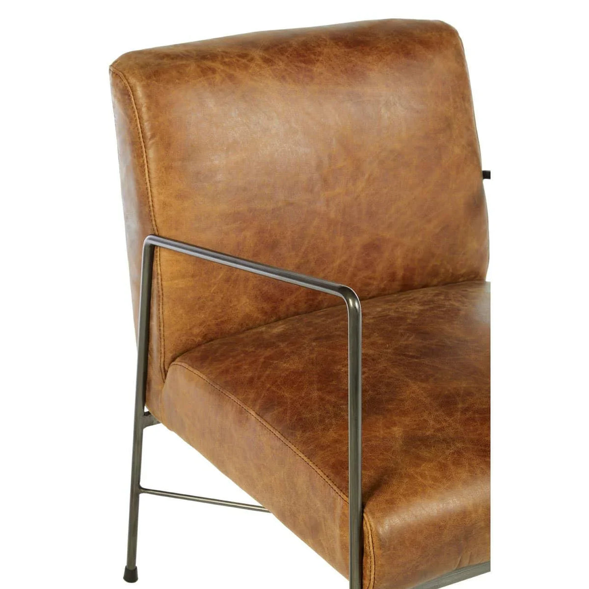 Brown leather armchair with metal frame and modern design, close-up of seat and back