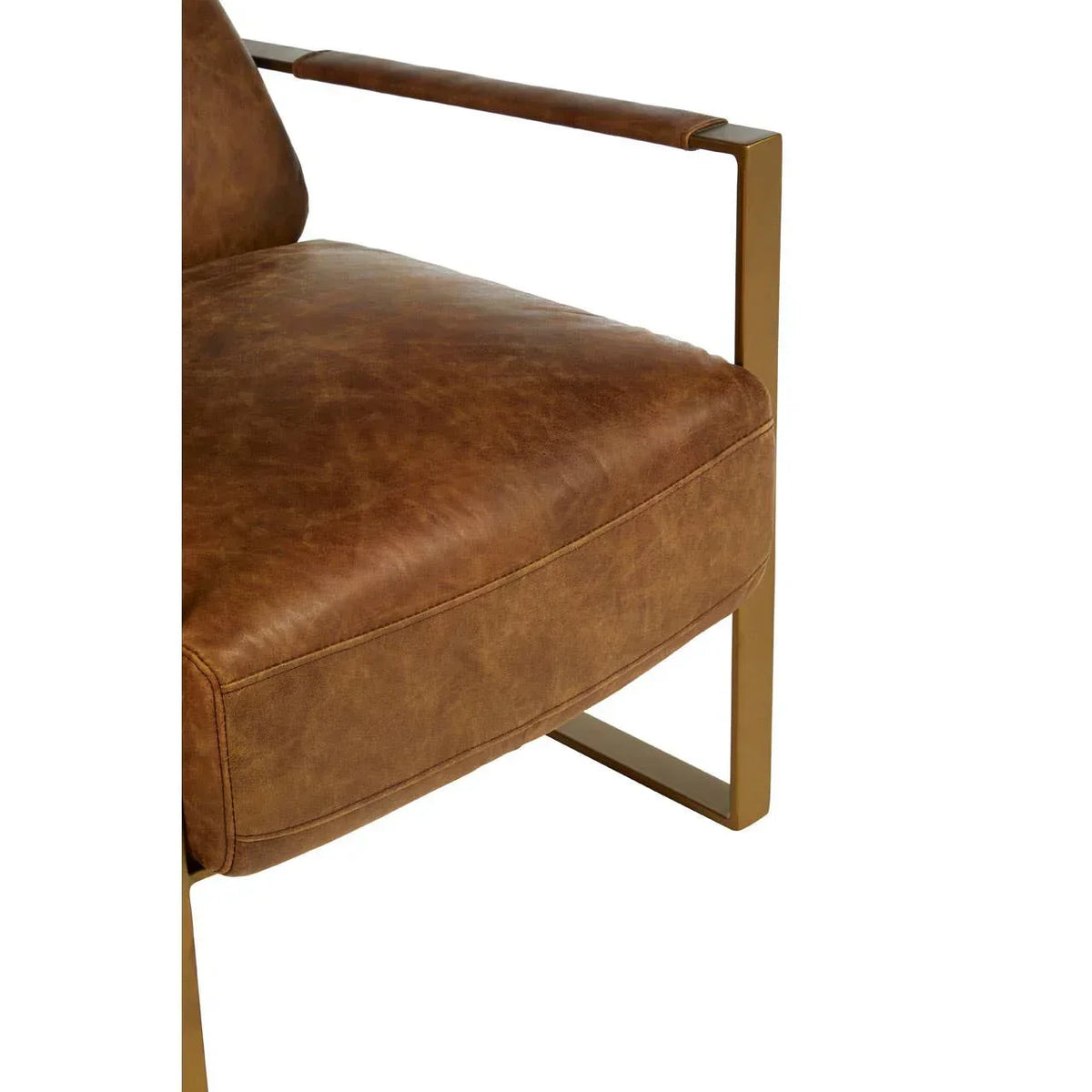 Brown leather armchair with metal frame and padded seat, side view close-up
