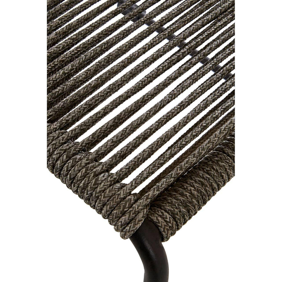 Closeup of woven rattan dining chair seat with black metal frame detail