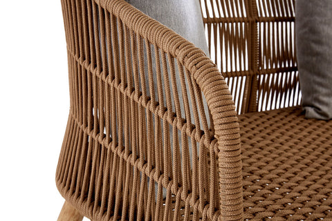 Woven rope sofa with a three-seater design, featuring a sturdy frame and a textured surface. The armrest has a rounded shape, and the woven pattern showcases a natural brown color. Soft cushions are placed on the seat, adding comfort and style
