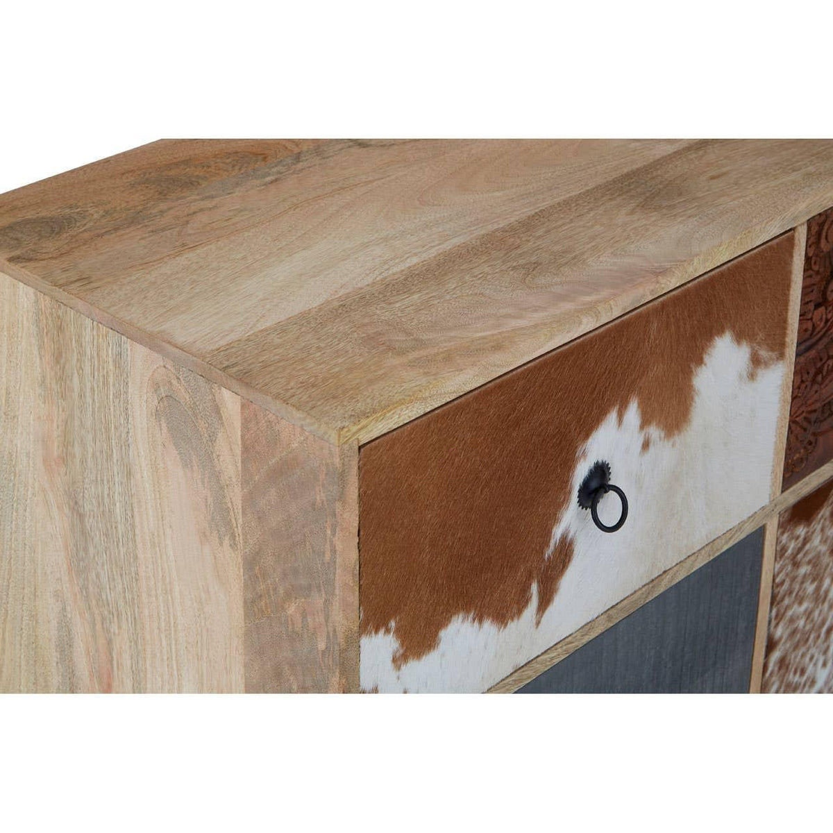 Mango wood chest of drawers with cowhide front panel and metal handle, close-up angle