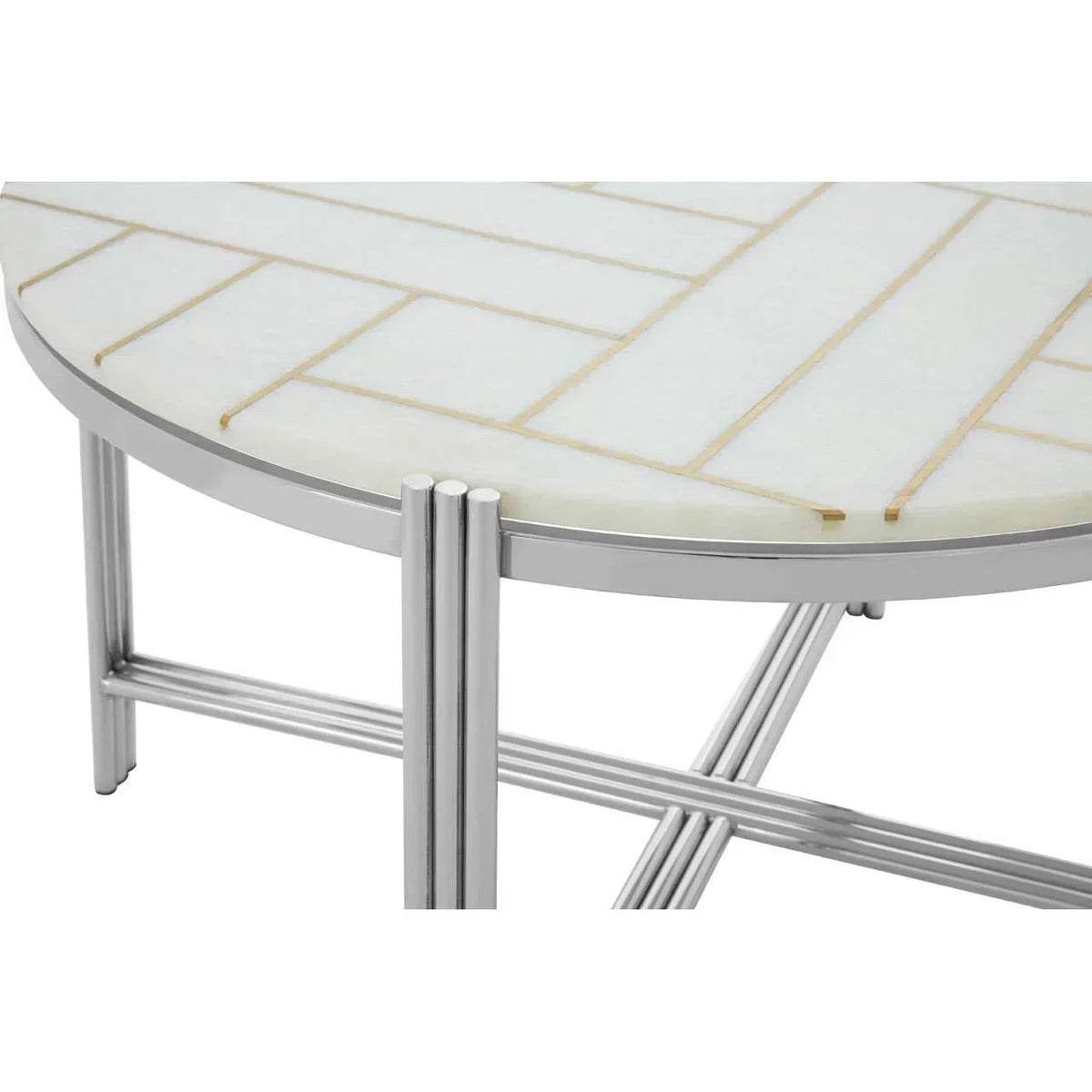 Round coffee table with white patterned top and chrome metal frame, close-up view