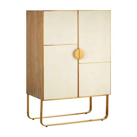 A stylish cabinet featuring a combination of oak wood and brushed gold accents. The cabinet has two doors with a smooth, light-colored finish and a round gold handle, standing on a sleek gold metal base. The overall design is modern and elegant, suitable for home decor