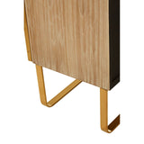 Close-up view of the Modica cabinet featuring a light oak wood finish with a brushed gold metal base. The cabinet has a sleek design with clean lines and a modern aesthetic, showcasing the contrast between the natural wood and the metallic legs