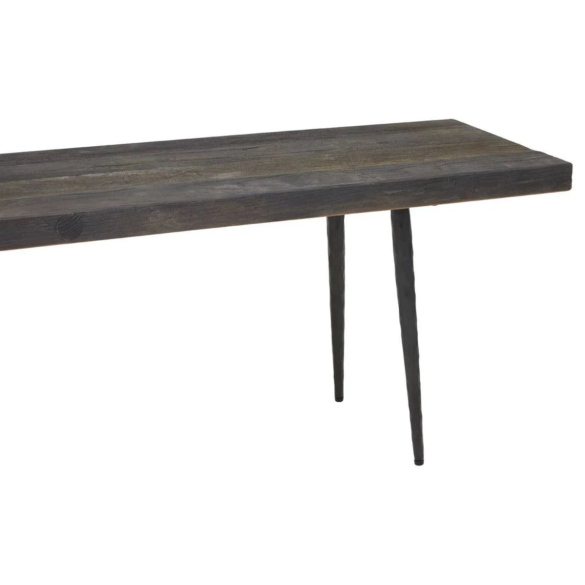 Industrial wood dining table with black tapered metal legs, partial side angle view