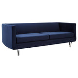 Navy velvet three-seater sofa with a sleek, modern design, featuring a low back and two plush seat cushions. The sofa has a minimalist silhouette and is supported by slender metal legs, adding a contemporary touch to any living space