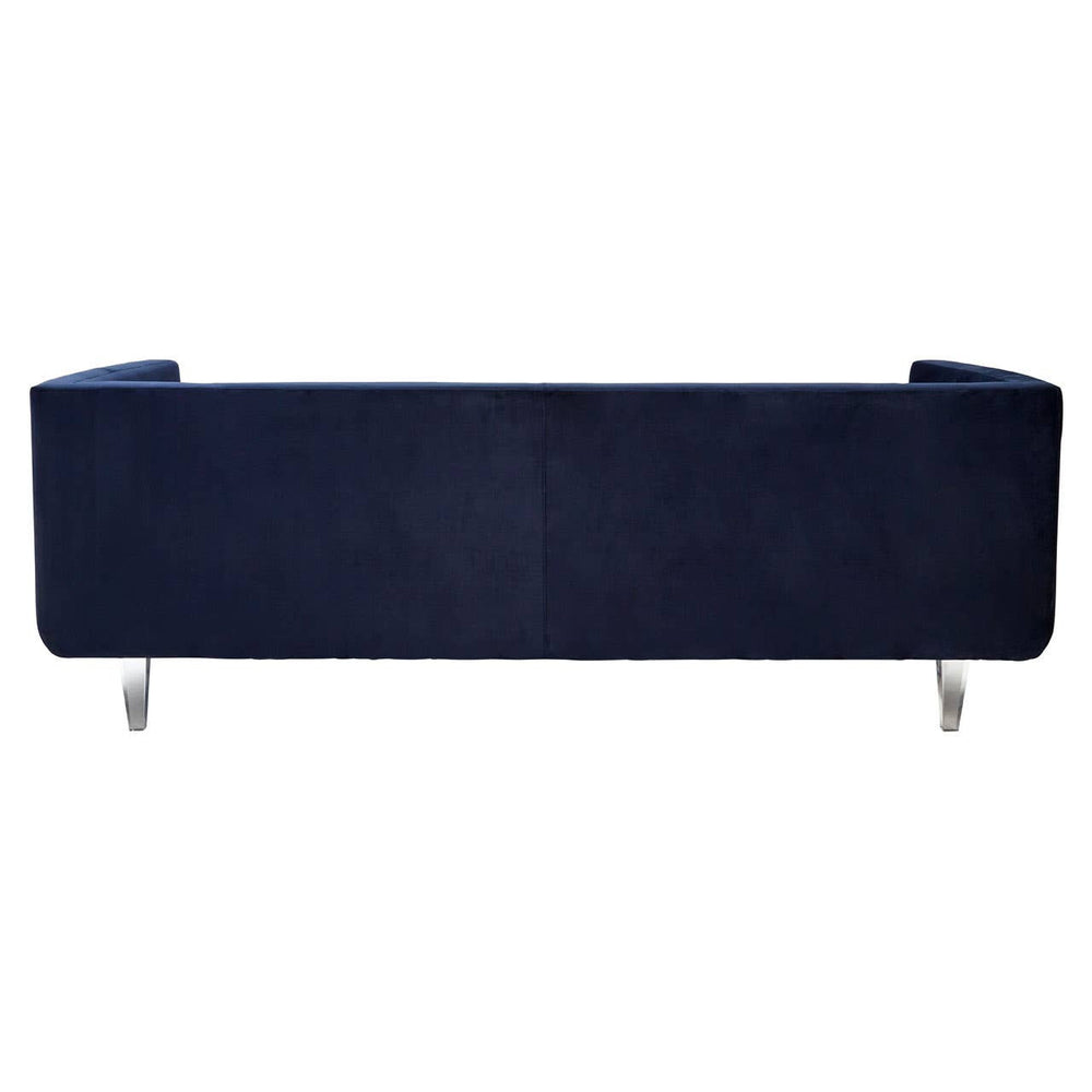 Navy velvet three-seater sofa with a sleek, modern design and straight lines, featuring chrome legs for a contemporary touch. The upholstery has a soft texture, and the overall shape is minimalist, making it suitable for various interior styles