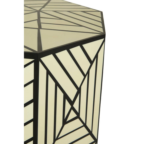 Geometric stool and side table featuring a hexagonal shape with an ivory surface adorned with black linear patterns, highlighting a modern and stylish design