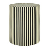 Round side table and stool featuring a striped design in ivory and black resin, with a smooth top and a sturdy base, suitable for indoor use