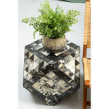 Antique green mosaic geometric hexagon side table with a reflective surface, featuring a small potted plant on top. The table has a unique hexagonal shape and is positioned next to a wooden chair, showcasing its decorative design and functionality in a home setting