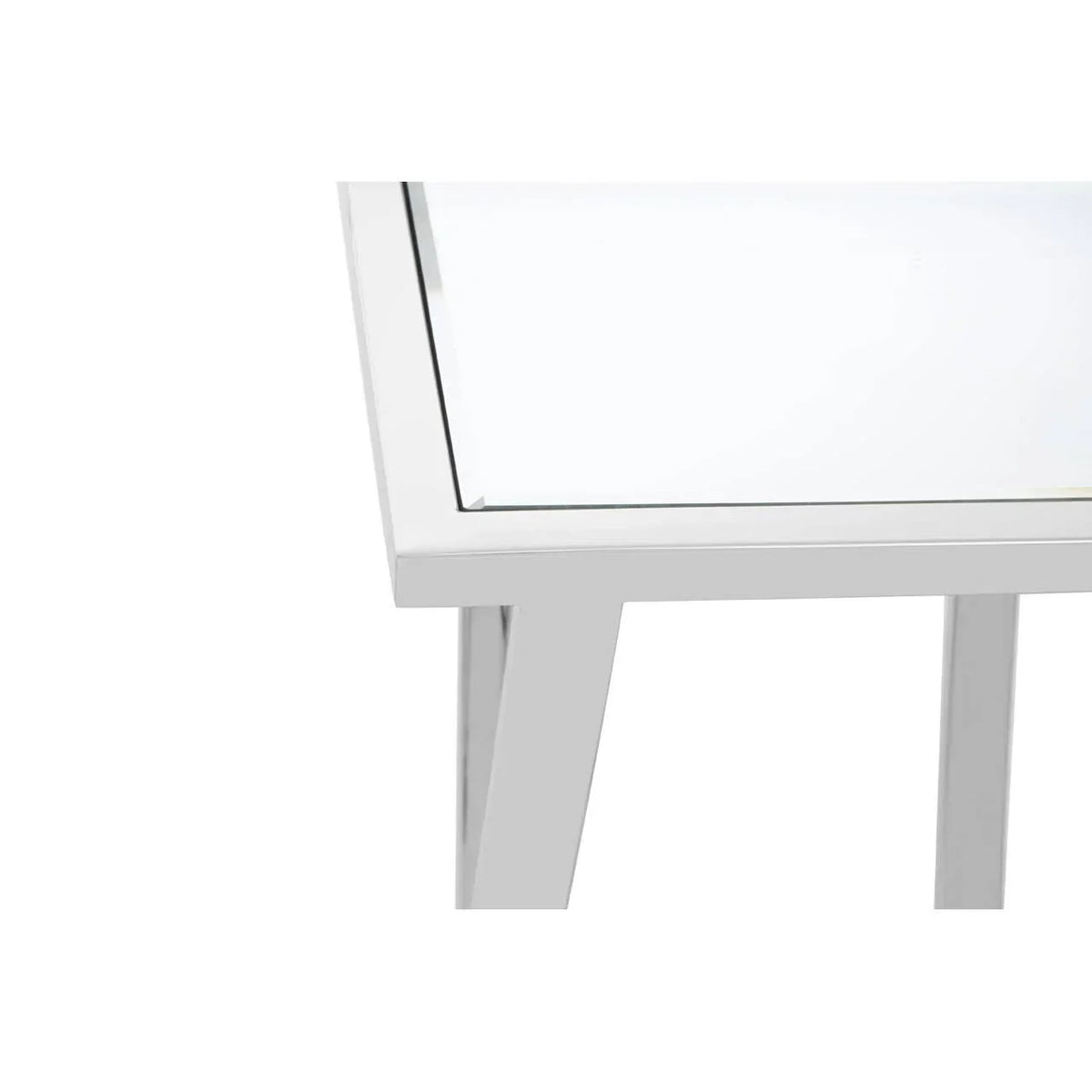 White dining table corner with glass top and angled metal legs