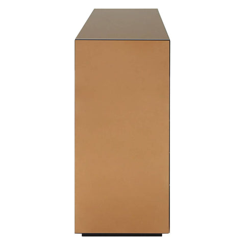 A sleek console table with a tinted mirror finish, featuring a rectangular shape and smooth edges. The surface is reflective, enhancing the modern aesthetic, while the base has a warm, metallic hue that complements the mirror. The overall design is minimalist and elegant, suitable for contemporary home decor