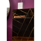 A stylish console table featuring a tinted mirror surface with geometric patterns and a sleek black base. The table is positioned against a vibrant purple wall, complemented by a modern pendant light hanging above