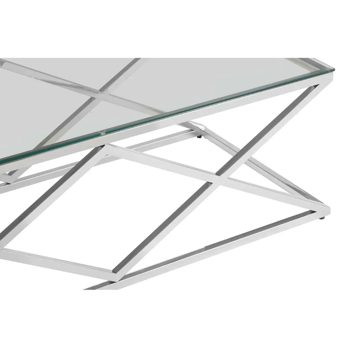 Glass coffee table with geometric chrome metal frame, modern design close-up