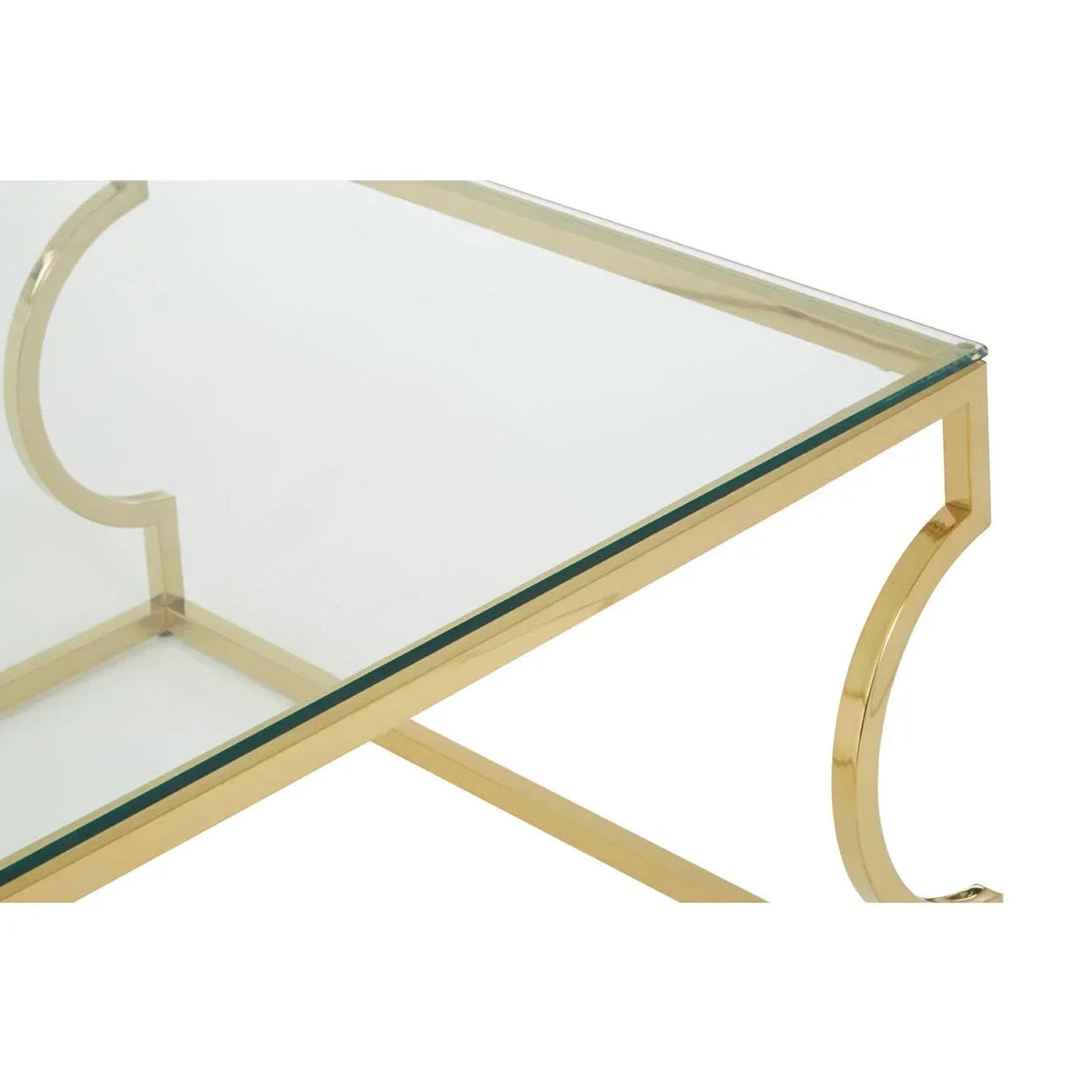Glass coffee table with gold metal frame and curved leg detail, corner angle view