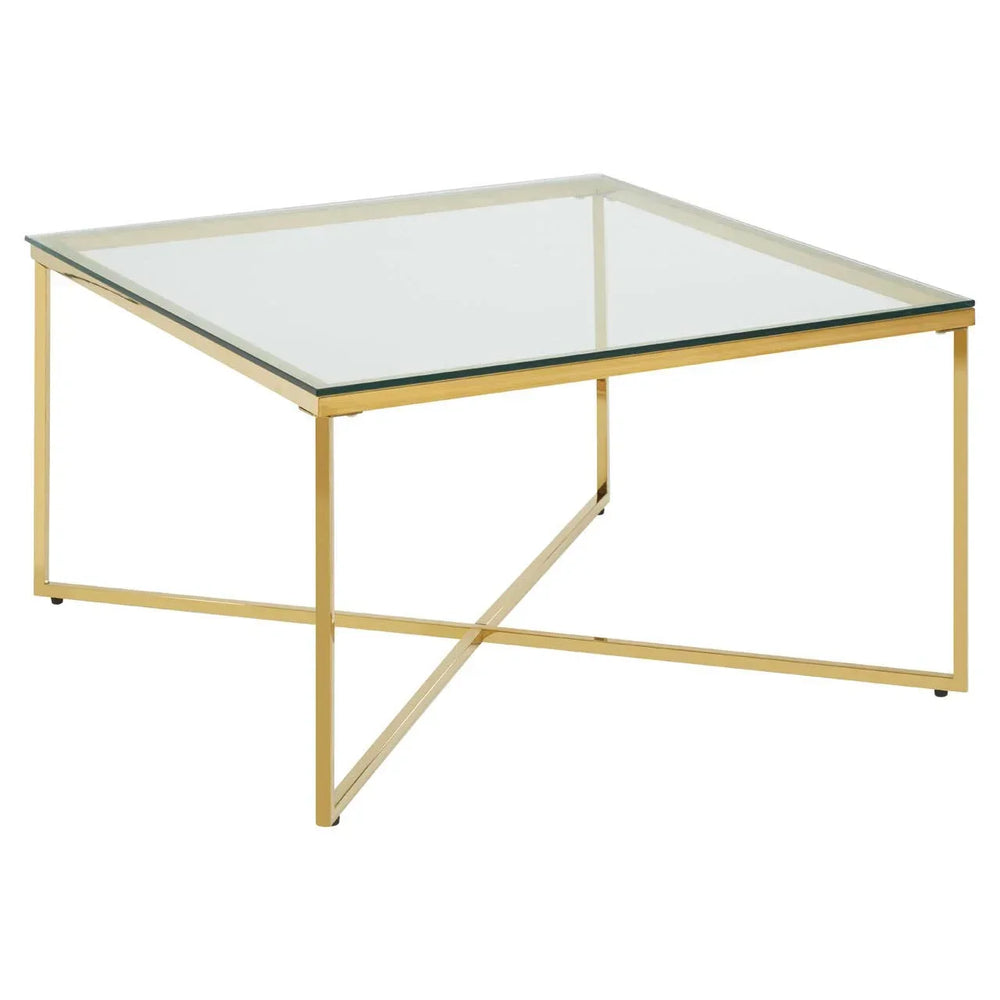 Square glass coffee table with gold metal frame and cross base, angled side view