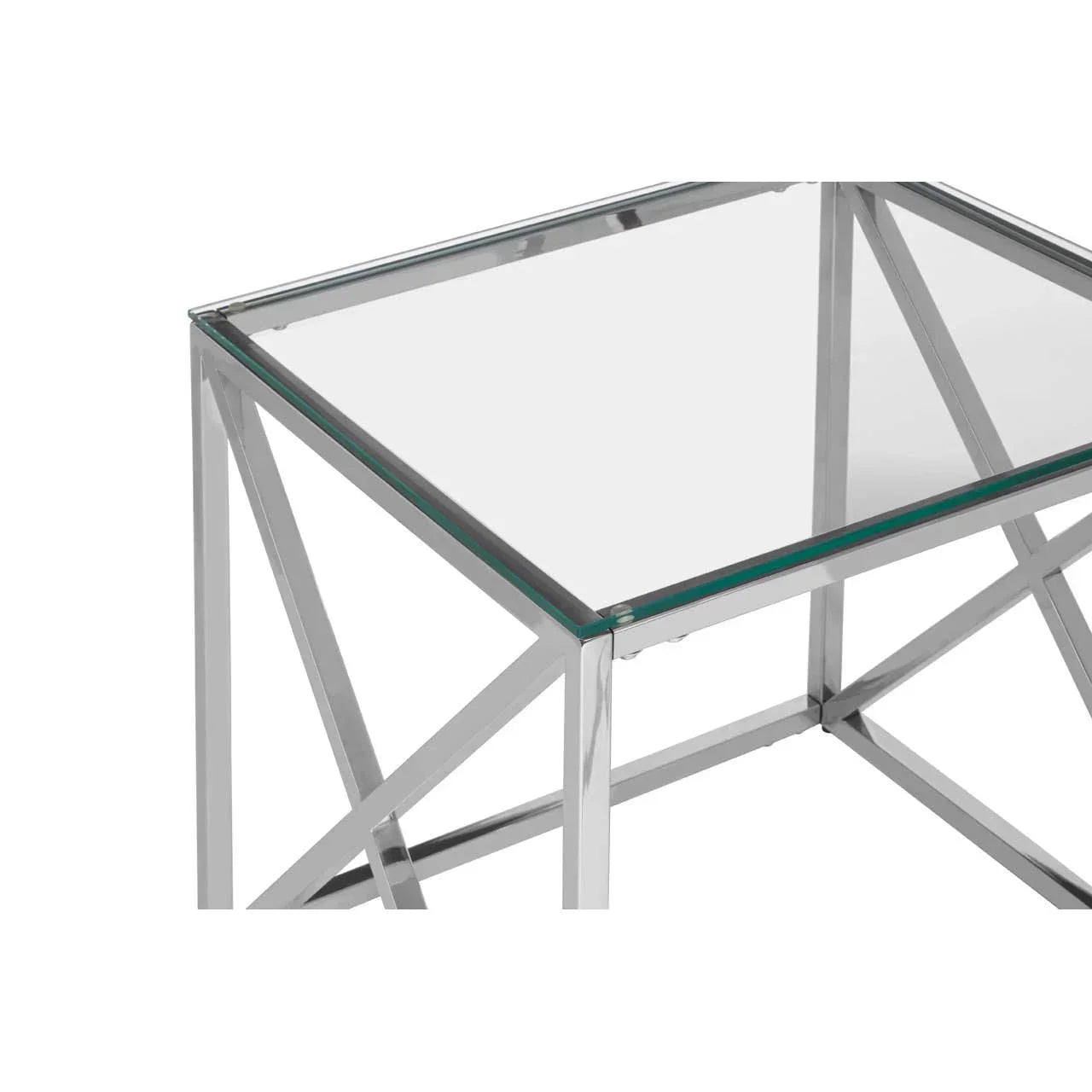 Glass top side table with chrome metal frame and geometric leg design